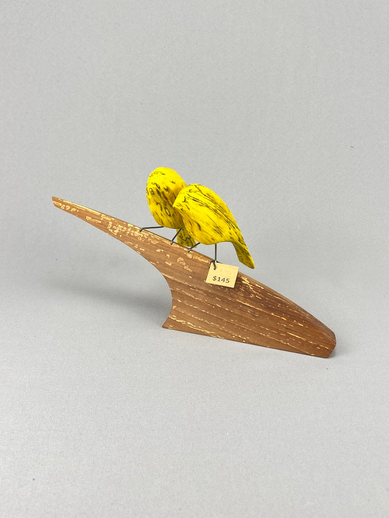 Yellow birds on swoosh