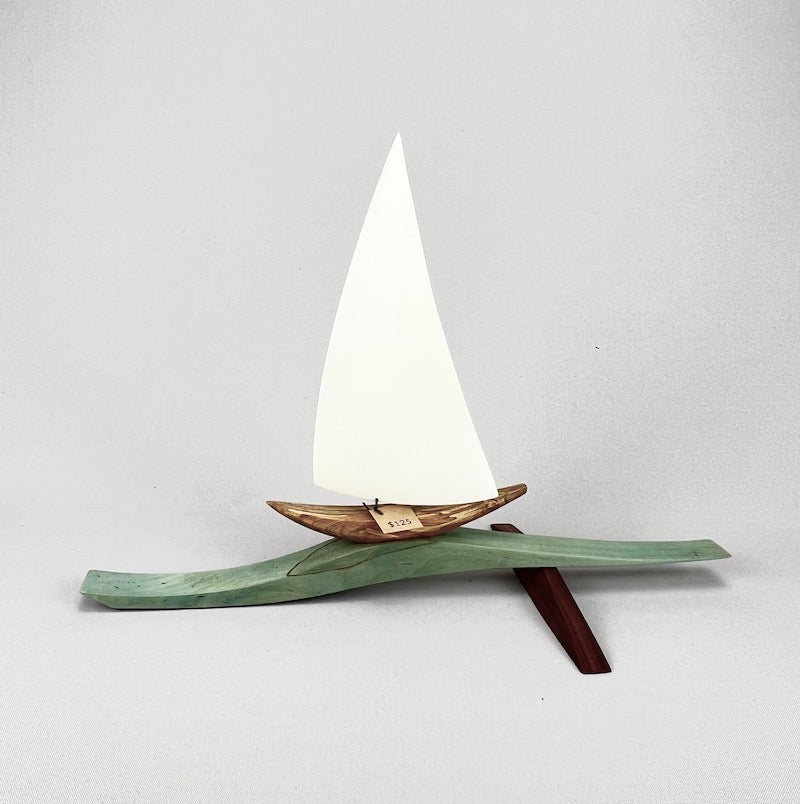 Sailboat on thin wave