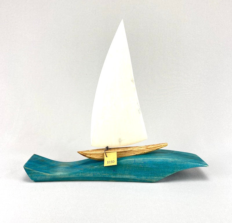 Sailboat on Large Wave